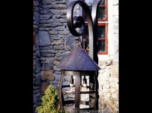 Rustic Forged Iron Coach Lamp. Patinated Iron.