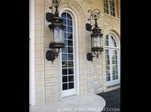 96" Tall Wall Sconces in Fabricated bronze with Custom Castings.