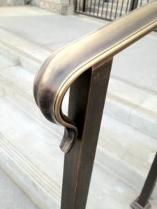 Lamb's Tongue End of a Fabricated Bronze Hand Rail