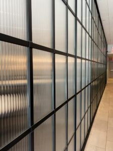 Custom Steel and Glass Screen Wall with Doors Colonade Hotel Boston