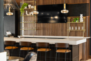 Custom Brass and Glass Bar Shelving with integral LED lighting